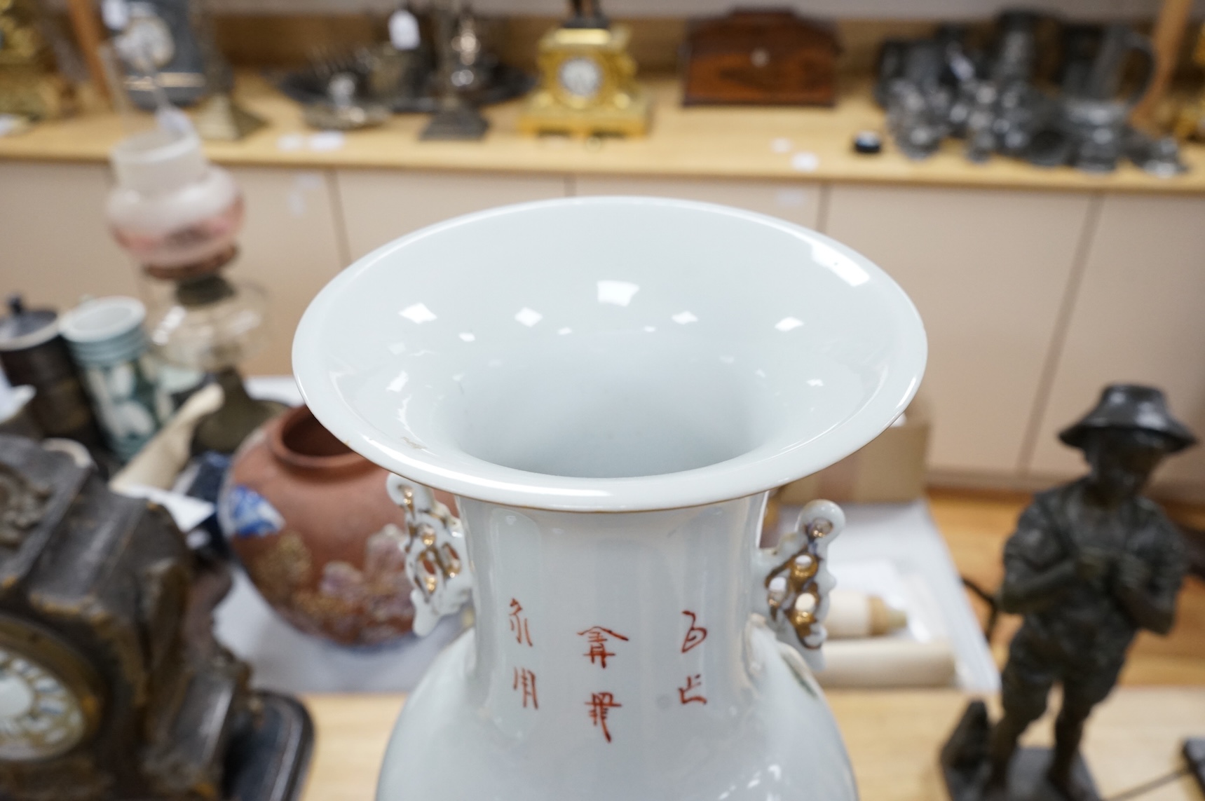 A large Chinese famille rose figural vase, 57cm high